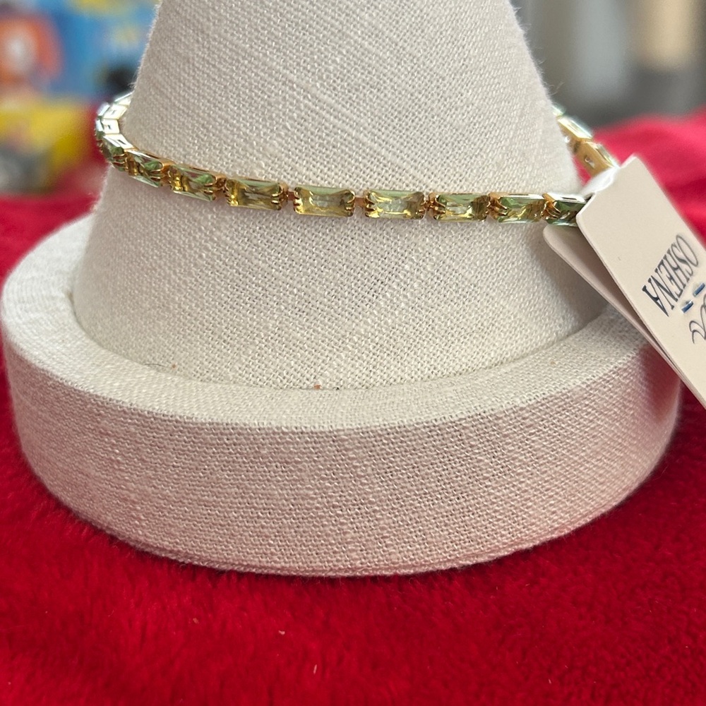 Oshena designer beachwear radiant faceted olive green stone Gold tennis Bracelet